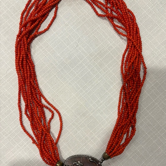 Handcrafted Red Multi-Strand Beaded Necklace with Oval Carved Elephant Pendant - Picture 3 of 5